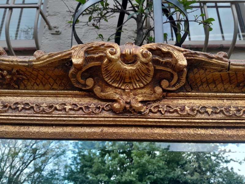 A 20th Century French Style Gilt Framed and Bevelled Mirror