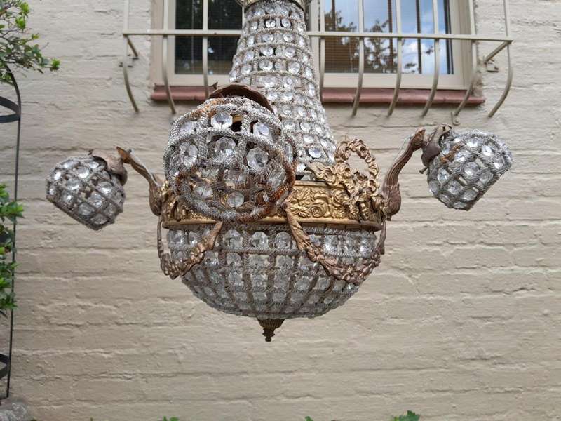 A Brass Gilt & Aged Monumental Empire Style Chandelier
