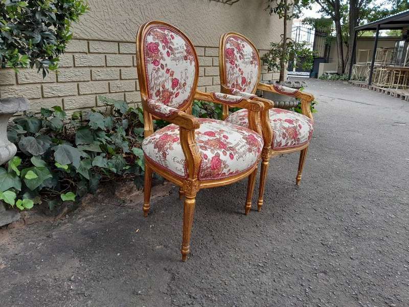 A French  Louis XVl Style Pair of Carved and Gold  Armchairs