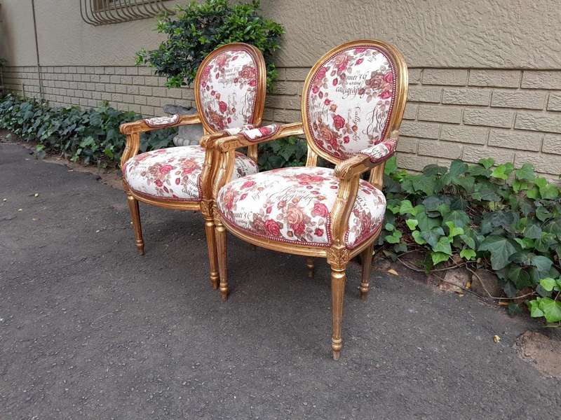 A French  Louis XVl Style Pair of Carved and Gold  Armchairs