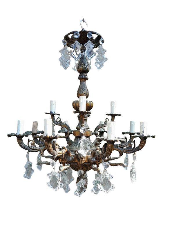 A 20th Century French Style Antique Brass and Crystal Twelve Light Chandelier