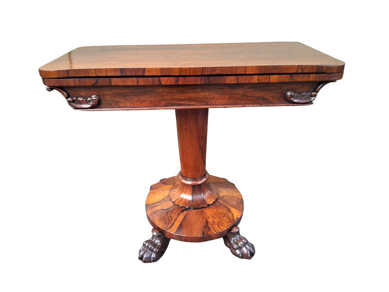 A 19TH Century William IV Rosewood Fold-over Card Table With Paw Feet