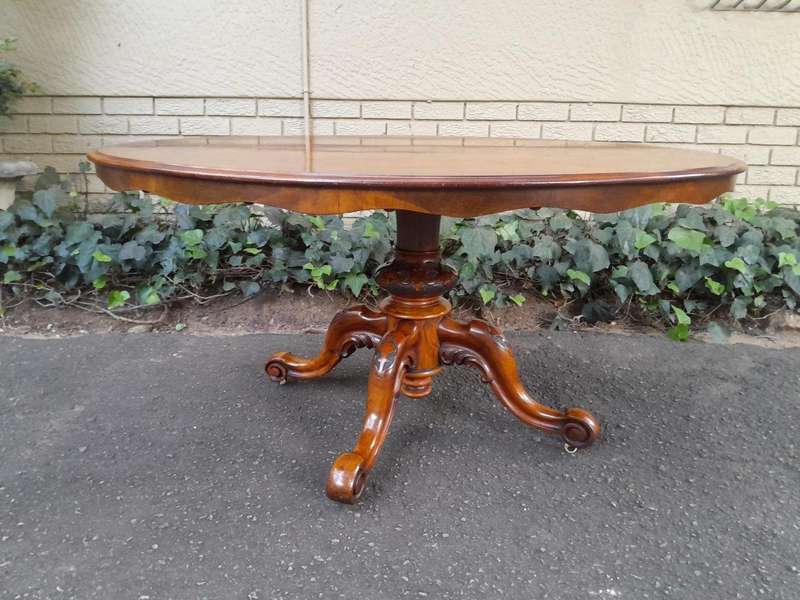 An Antique Victorian Burr Walnut Folding Table with Carved Base