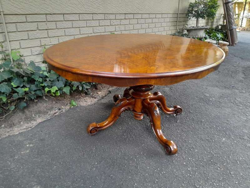 An Antique Victorian Burr Walnut Folding Table with Carved Base