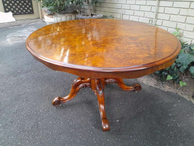 An Antique Victorian Burr Walnut Folding Table with Carved Base