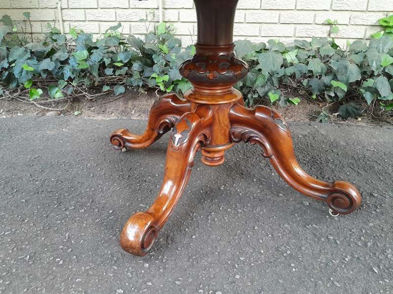An Antique Victorian Burr Walnut Folding Table with Carved Base