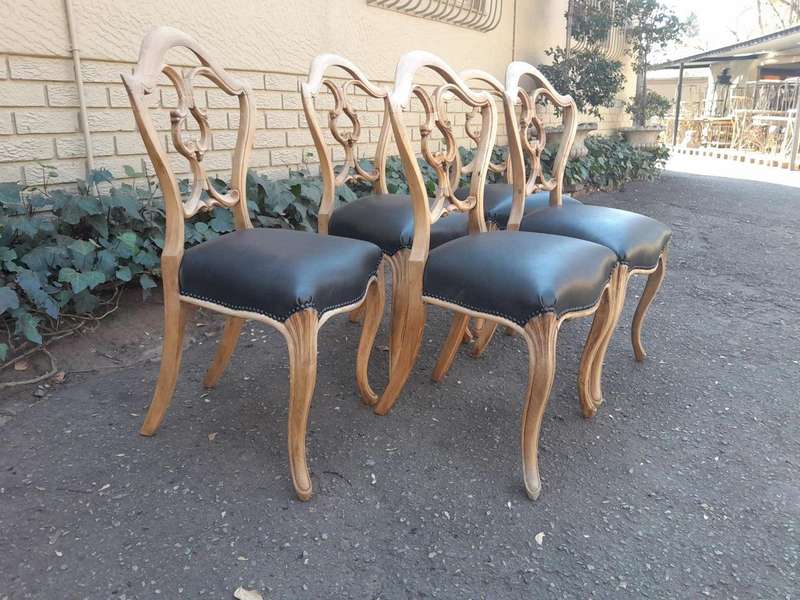 A 20th Century Set Of Five Carved Mahogany Dining Chairs In A Contemporary Bleached  /  Natural F...