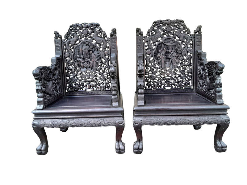 An Early 20th Century Circa 1920 Pair of Oriental Ornately Carved Throne Chairs