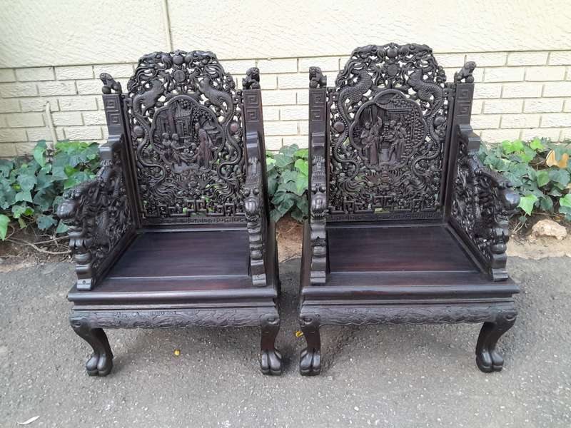 An Early 20th Century Circa 1920 Pair of Oriental Ornately Carved Throne Chairs
