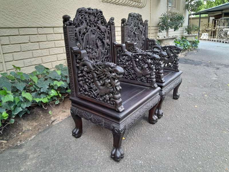 An Early 20th Century Circa 1920 Pair of Oriental Ornately Carved Throne Chairs