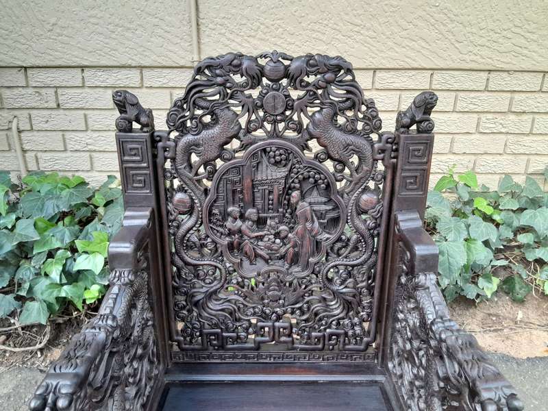 An Early 20th Century Circa 1920 Pair of Oriental Ornately Carved Throne Chairs