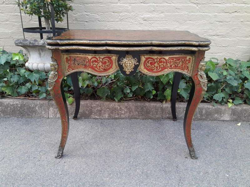 A 19TH Century Boulle and Ebonised Orrmolu Mount Card Table