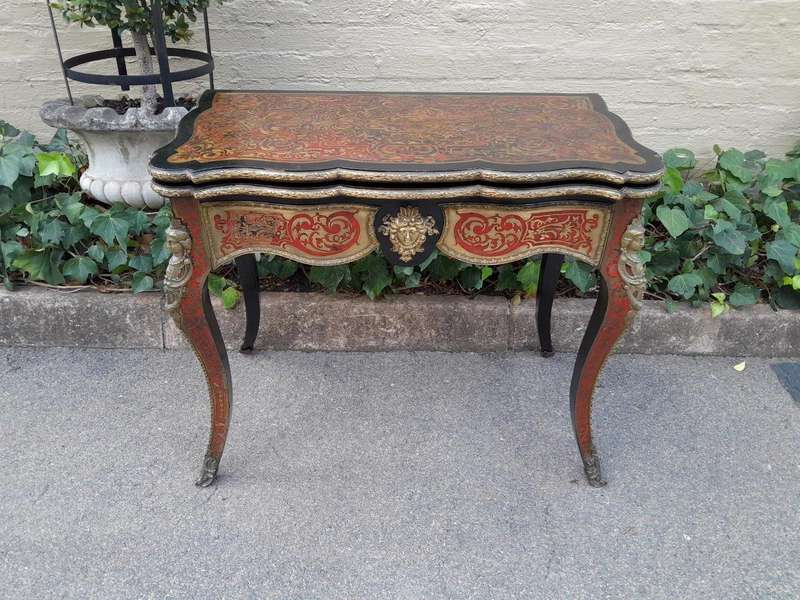 A 19TH Century Boulle and Ebonised Orrmolu Mount Card Table