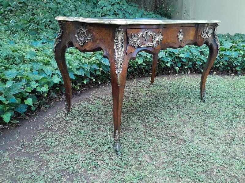 A 19TH Century French Walnut and Ormolu Mounted Desk/Writing Table/Plat with Tilt Tooled Leather ...
