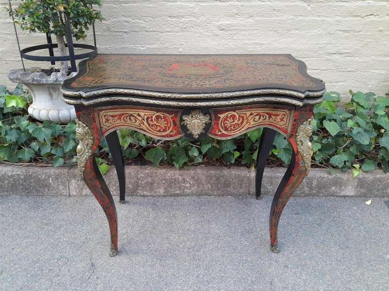 A 19th Century Boulle, Ebonised and Ormolu Mounted Cart Table