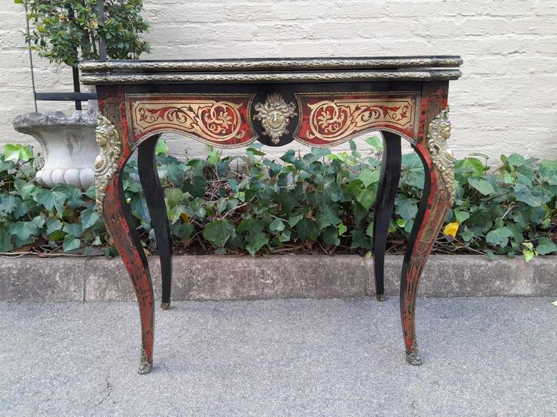 A 19th Century Boulle, Ebonised and Ormolu Mounted Cart Table