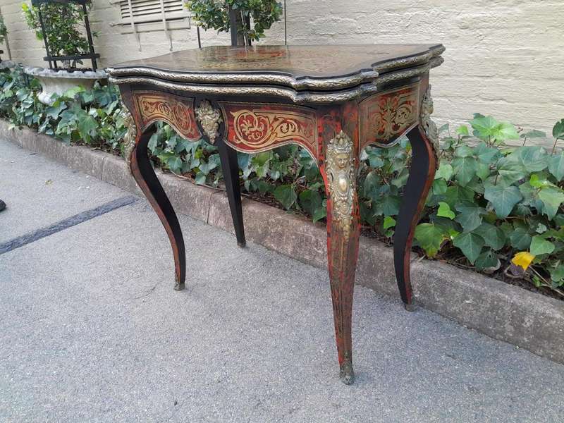 A 19th Century Boulle, Ebonised and Ormolu Mounted Cart Table