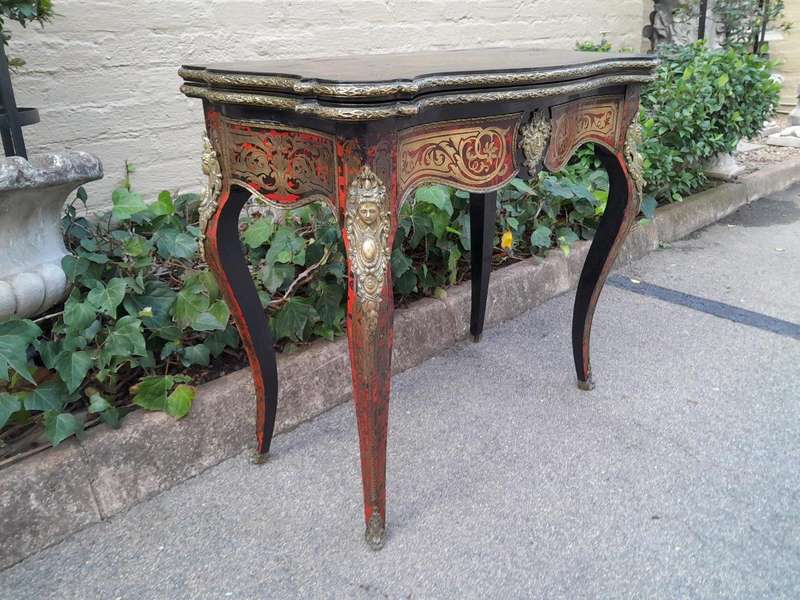 A 19th Century Boulle, Ebonised and Ormolu Mounted Cart Table