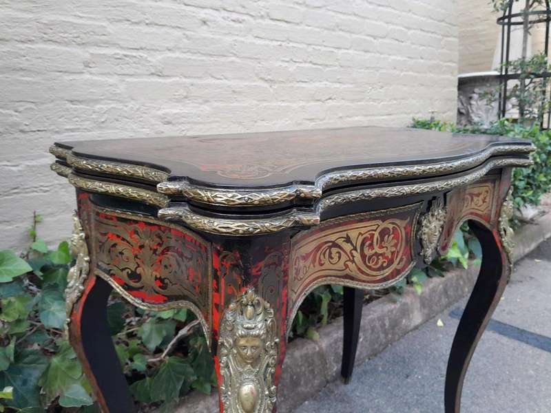 A 19th Century Boulle, Ebonised and Ormolu Mounted Cart Table