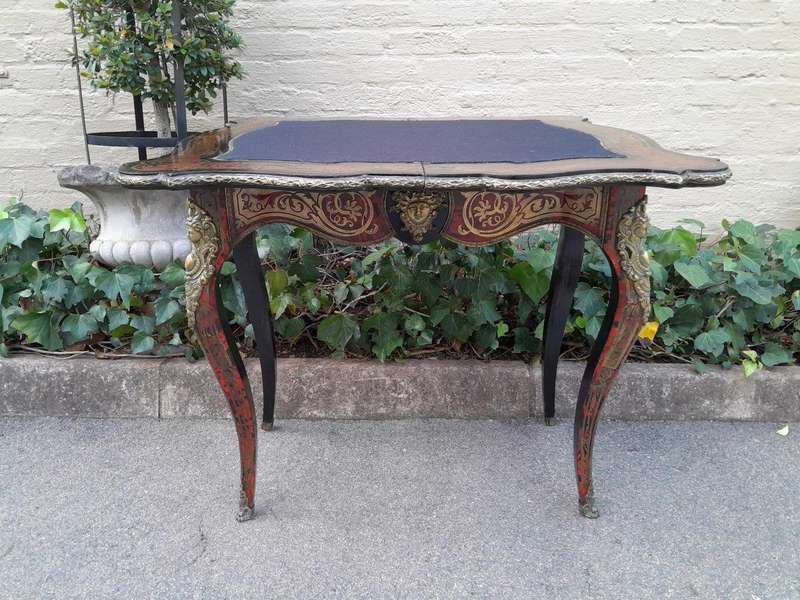 A 19th Century Boulle, Ebonised and Ormolu Mounted Cart Table
