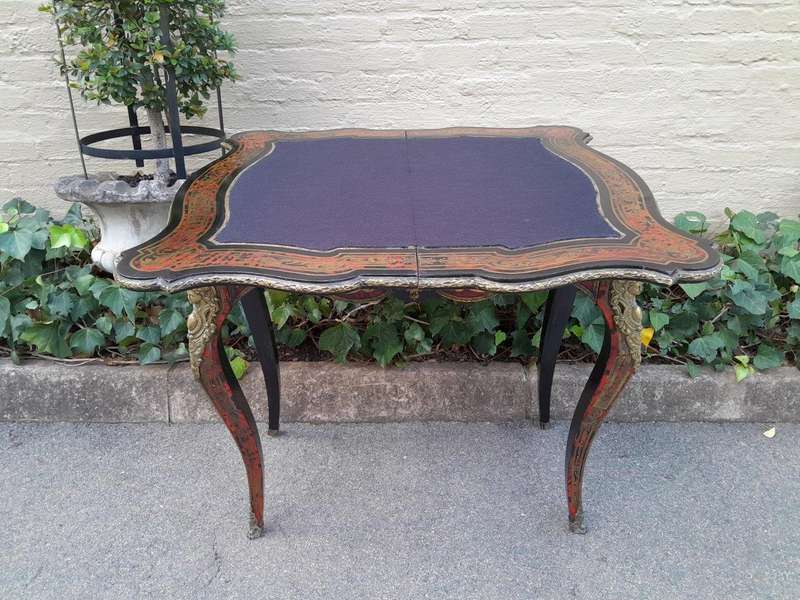 A 19th Century Boulle, Ebonised and Ormolu Mounted Cart Table