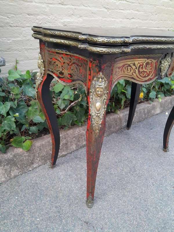A 19th Century Boulle, Ebonised and Ormolu Mounted Cart Table