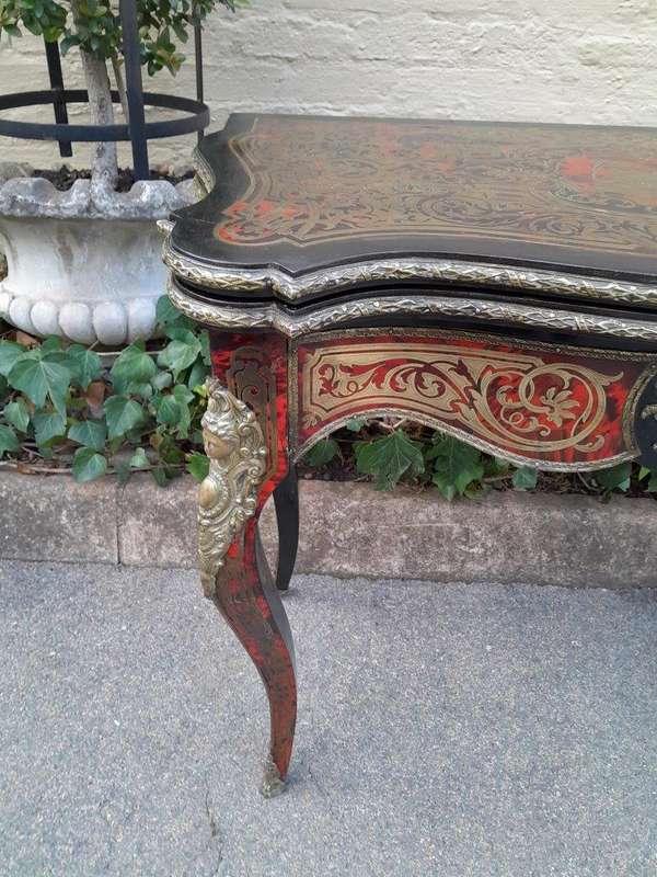 A 19th Century Boulle, Ebonised and Ormolu Mounted Cart Table