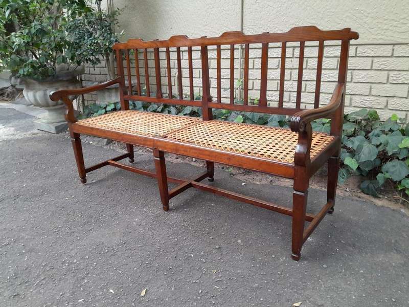 A 19th Century Cape Stinkwood Neo Classical Bench with Rattan Seat