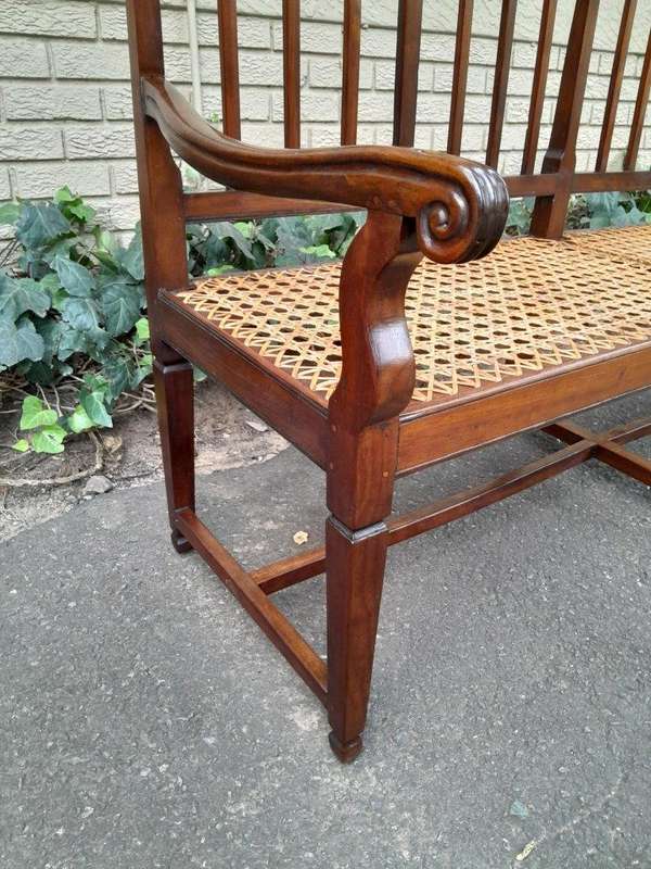 A 19th Century Cape Stinkwood Neo Classical Bench with Rattan Seat
