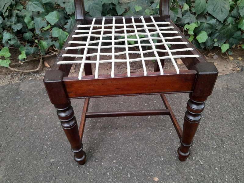 A 19th Century Set of Eight Cape Stinkwood Dining Charis with Riempie Seat Comprising Two Carvers...