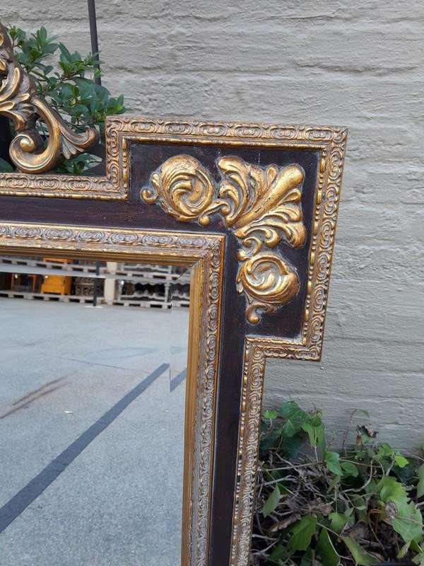 A 20TH Century Carved and Gilded Bevelled Mirror