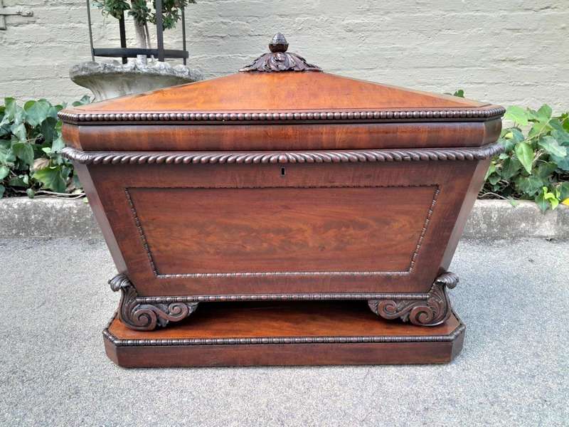 A 19th Century Flame Mahogany Wooden Carved  Cellarette on Carved Feet (Interior with Lead Linin...