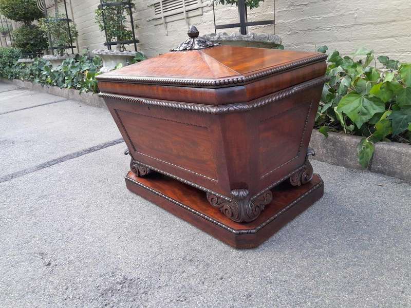A 19th Century Flame Mahogany Wooden Carved  Cellarette on Carved Feet (Interior with Lead Linin...