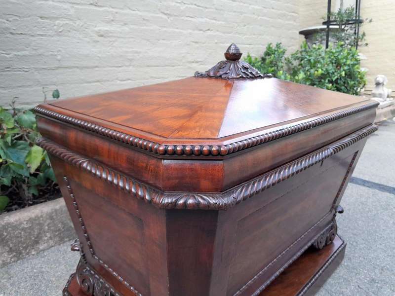 A 19th Century Flame Mahogany Wooden Carved  Cellarette on Carved Feet (Interior with Lead Linin...