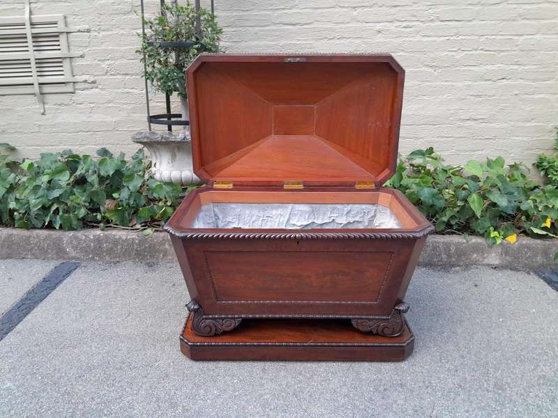 A 19th Century Flame Mahogany Wooden Carved  Cellarette on Carved Feet (Interior with Lead Linin...