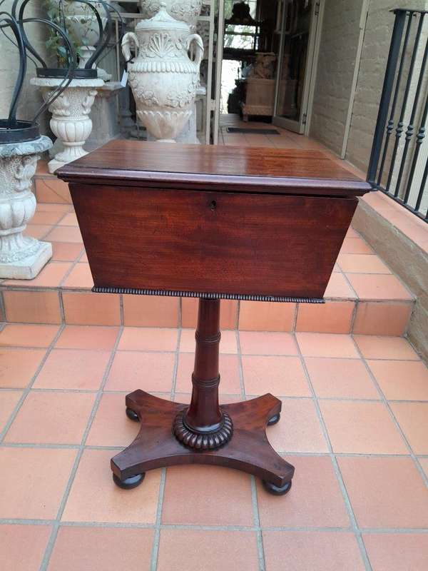 An Early 19th Century Regency Mahogany Tea Poy on Stand
