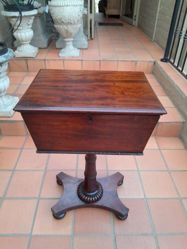An Early 19th Century Regency Mahogany Tea Poy on Stand