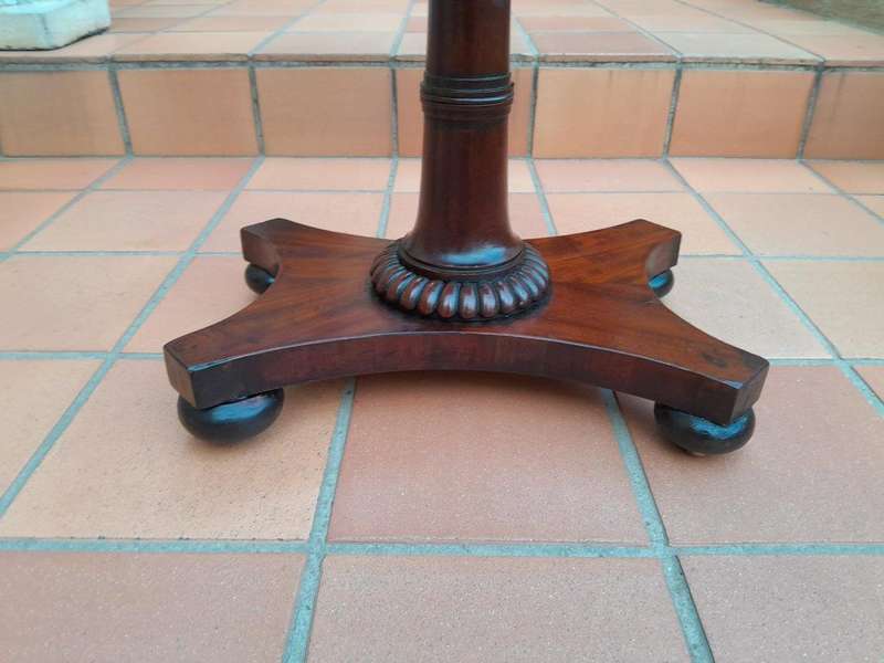 An Early 19th Century Regency Mahogany Tea Poy on Stand