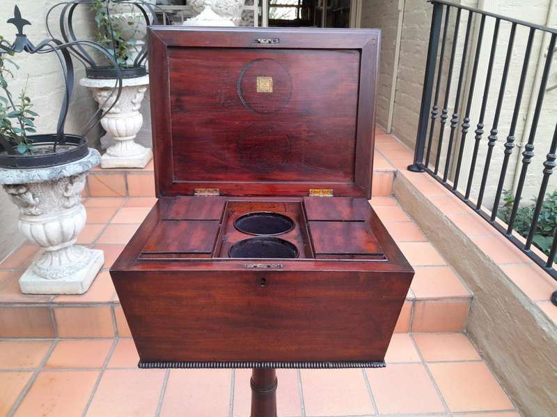 An Early 19th Century Regency Mahogany Tea Poy on Stand