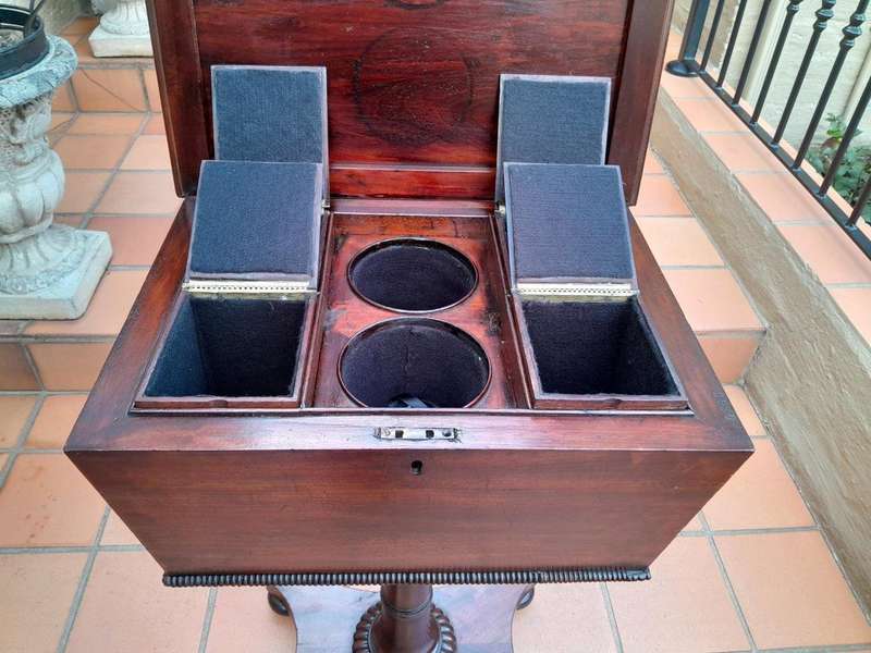 An Early 19th Century Regency Mahogany Tea Poy on Stand