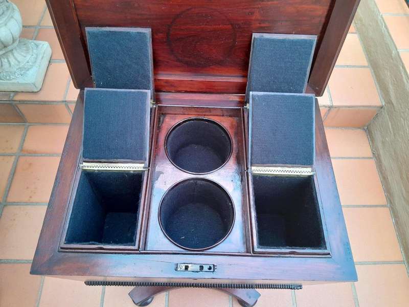 An Early 19th Century Regency Mahogany Tea Poy on Stand
