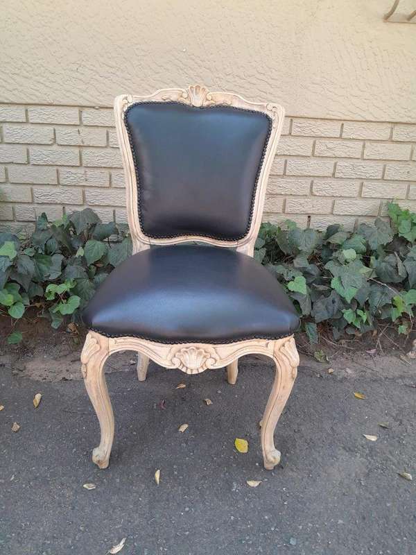 A 20th Set of Six French Style Dining Chairs in a Bleached Contemporary Finish and Upholstered in...