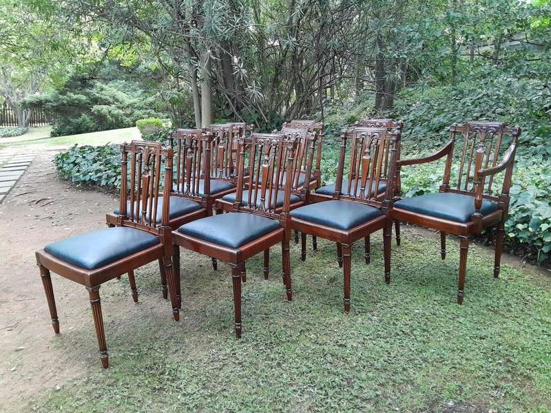 A 20th Century George III Hepplewhite Style Set of Ten Dining Chairs Comprising a Pair of Carvers...