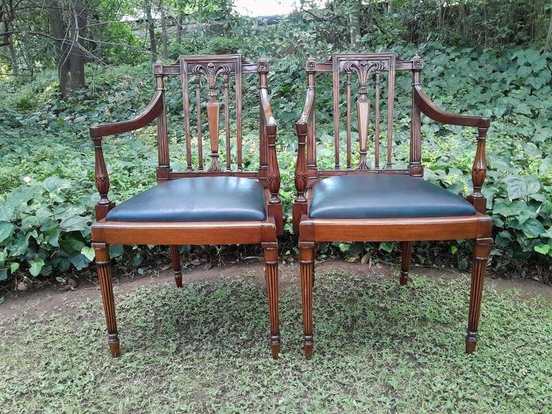A 20th Century George III Hepplewhite Style Set of Ten Dining Chairs Comprising a Pair of Carvers...
