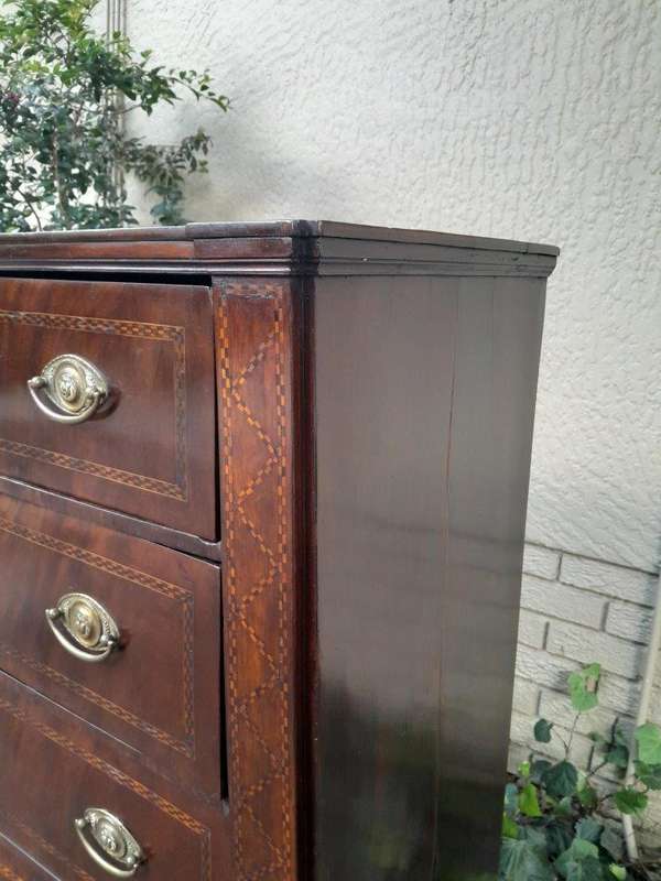 A 19th Century Victorian Flame Mahogany and Inlaid Chest of Drawers