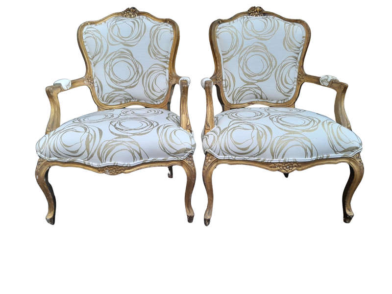 A 19th Century Pair of French Carved and Gilded Wooden Armchairs Upholstered in a Custom Made Fab...