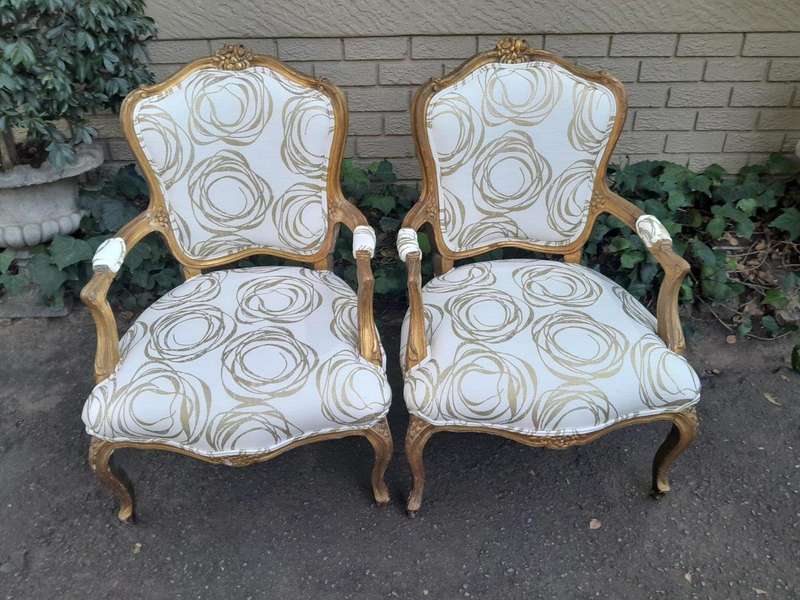A 19th Century Pair of French Carved and Gilded Wooden Armchairs Upholstered in a Custom Made Fab...