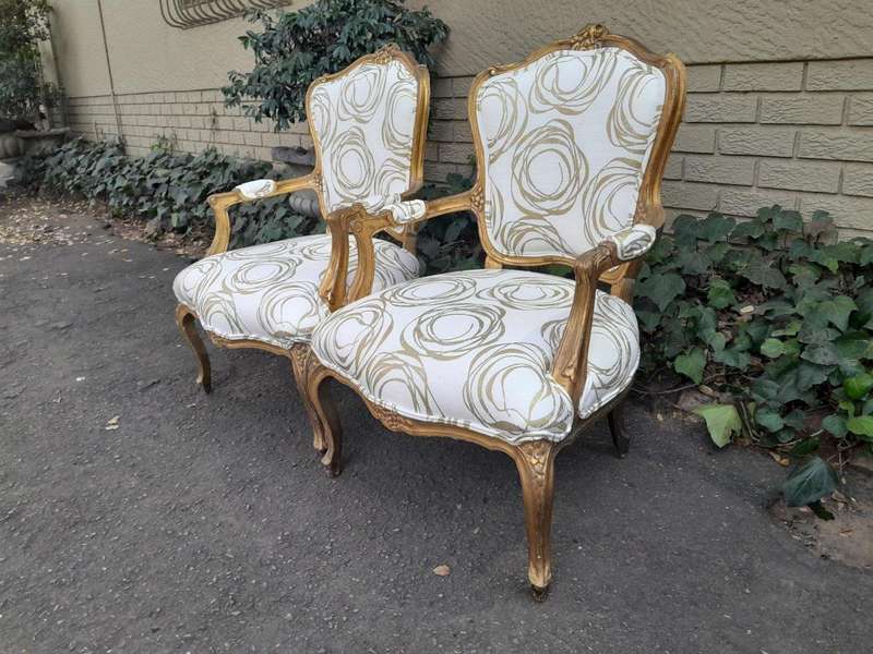 A 19th Century Pair of French Carved and Gilded Wooden Armchairs Upholstered in a Custom Made Fab...