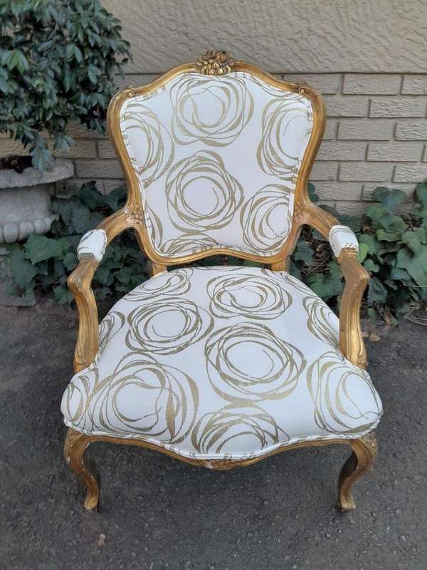 A 19th Century Pair of French Carved and Gilded Wooden Armchairs Upholstered in a Custom Made Fab...