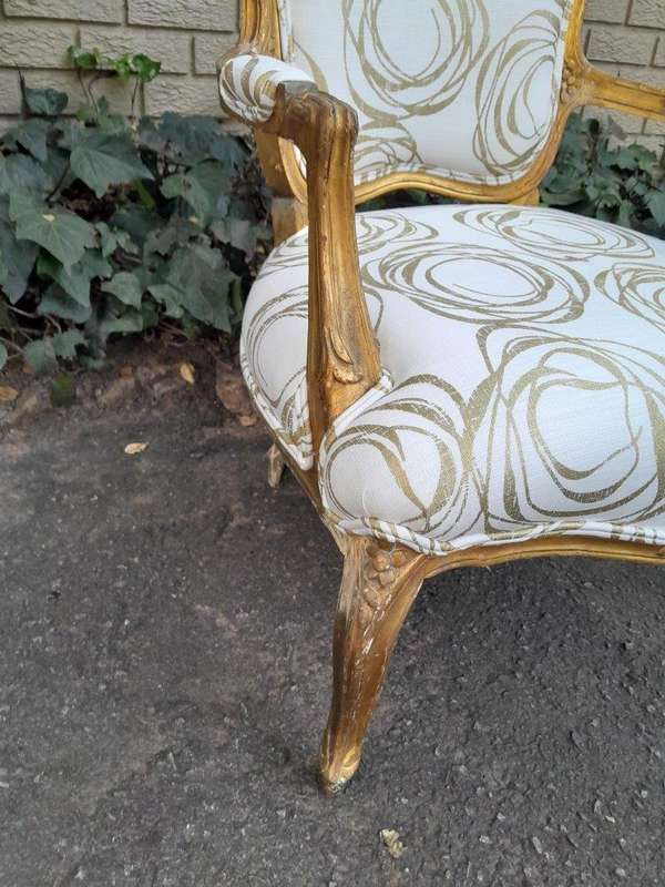 A 19th Century Pair of French Carved and Gilded Wooden Armchairs Upholstered in a Custom Made Fab...